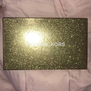 Michael kors wristlet. Never used.